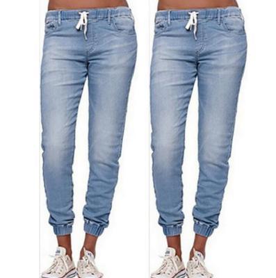 Jean skinny vert à taille élastique et bride à la cheville pour femmes